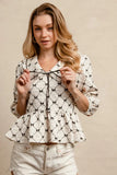 Geometric Print Peplum Blouse with Tie-Front V-Neck Collar