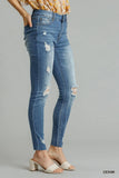 Edgy Distressed Denim Skinny Jeans with Raw Hem